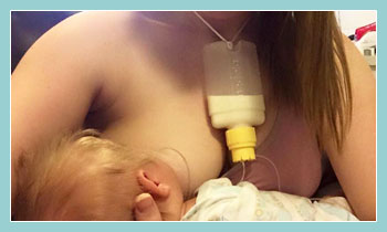 Photo of child breast feeding.