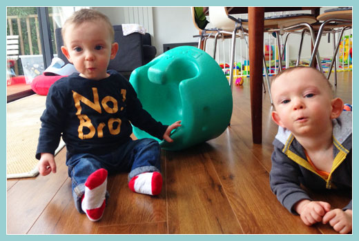 Image of Heynan twin brothers several years old - both happy and healthy